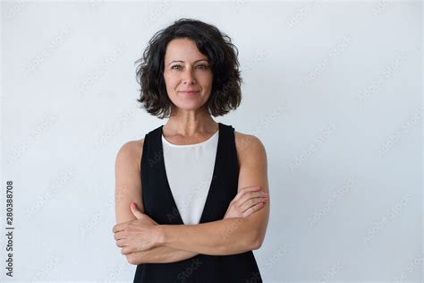 Cheerful Middle Aged Woman With Curly Hair Portrait Of Attractive