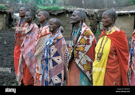 africa kenya masai mara national reserve masai women singing dressed in traditional kanga cloths