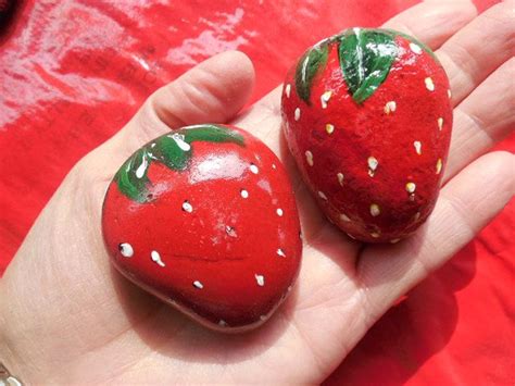 10 Rocks Painted Like Strawberries