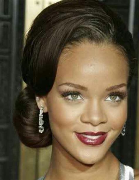 Rihanna Looking Elegant And Classy With A Side Bun And Burgundy Lips