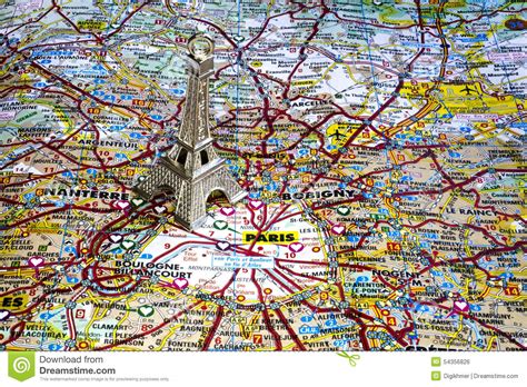 Silver Color Eiffel Tower On The Paris Map Stock Photo