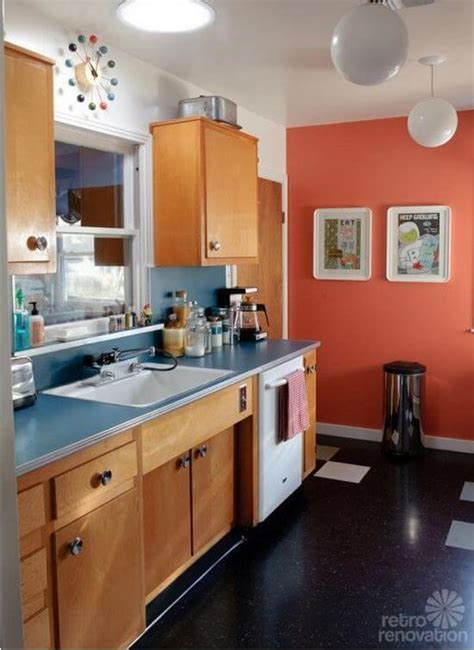 Installing kitchen cabinets isn't a job for your average homeowner. Sarah's "super economical" retro kitchen remodel featuring ...