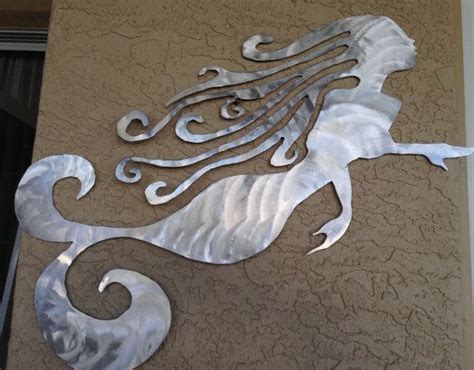 Shop our best selection of metal outdoor wall art to reflect your style and inspire your outdoor space. Metal Mermaid wall art for home or garden by ...
