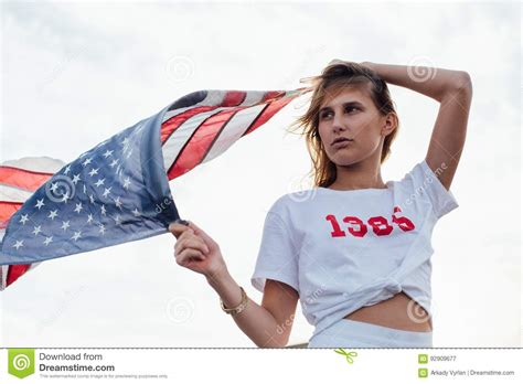 Blonde Female Model Holds Up American Flag Stock Image Image Of Adult