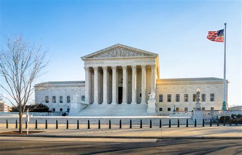 The chief justice of the united states and eight associate justices. The United States Supreme Court building - Washington, D.C ...