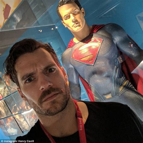 Henry Cavill Snaps A Selfie In Front Of Statue Of Superman Daily Mail