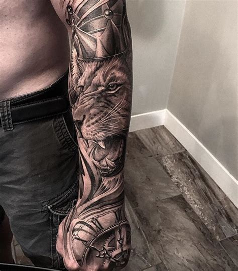 Sleeve tattoos allow guys to bring some of the best tattoo ideas to life. Crowned Lion & Clock Sleeve | Best tattoo design ideas