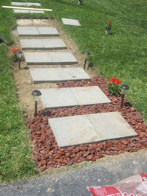 Love the idea of being able to design what i want to do in the garden area, and actually being able to get the effects i want easily by myself. Paint Speckled Pawprints: A Walkway Reveal | Diy patio pavers, Paver walkway, Backyard landscaping