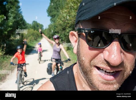 A family cycle through nature in rural france and explore the landscape