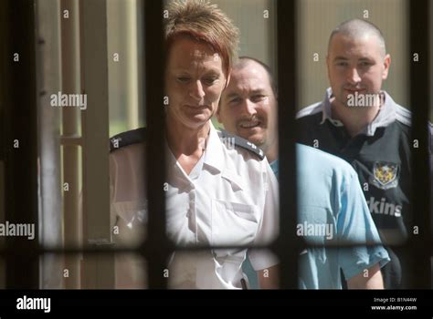Female Warder Escorts Two Inmates At Woodhill Prison Milton Keynes Stock Photo Royalty Free