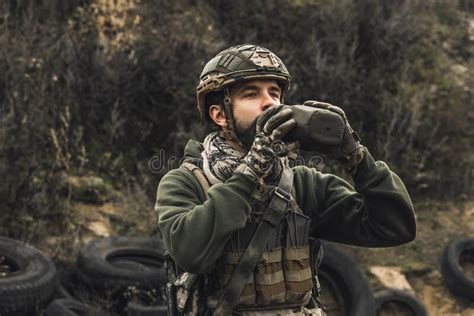Soldier In Military Uniform Drinking From Flask Stock Image Image Of