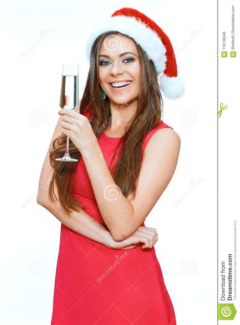 Smiling Celebrating Woman Wearing Red Dress And Santa Hat Holdi Stock