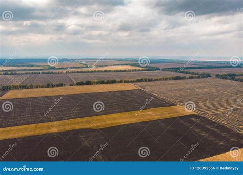 Aerial Panoramic View Of Agricultural Farm Fields Or Meadows In