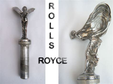 Maybe you would like to learn more about one of these? Original Vintage Car Rolls Royce Hood Monogram Emblem Logo