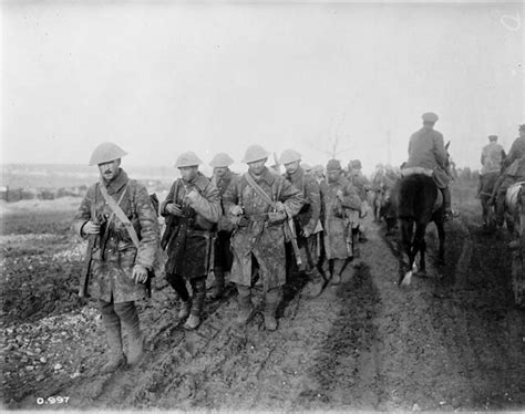 Image courtesy of canadian department of national defence/library and the red chateau. Canadian soldiers returning from trenches during the Battl ...