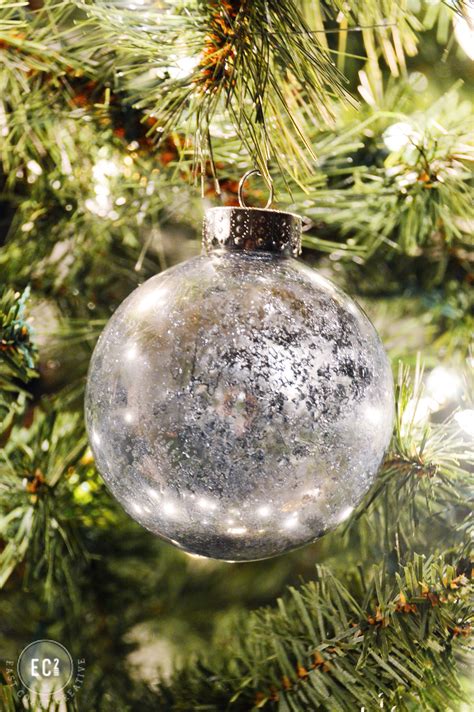 I love the look of mercury glass, there is something magical about the shiny, aged sparkle. DIY Winter Crystal Mercury Glass Ornaments | East Coast Creative