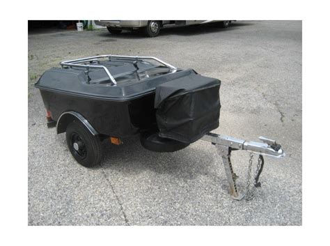 It comes with a spacious 14 cubic feet of storage space. Shore Motorcycle Trailer Pull Behind motorcycles for sale