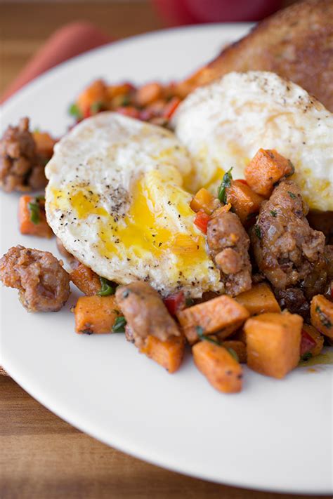 Autumn Sweet Potato Hash With Spicy Italian Sausage And Asiago Cheese