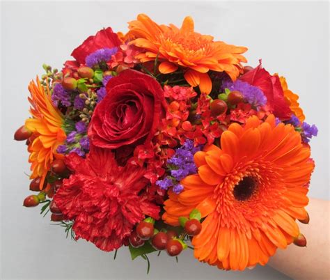 Wedding bouquets with daisies and roses. Posy wedding bouquet with orange gerbera daisies, red ...