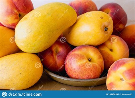 Yellow Mangoes And Peaches Fresh Fruits Close Up Stock Image Image