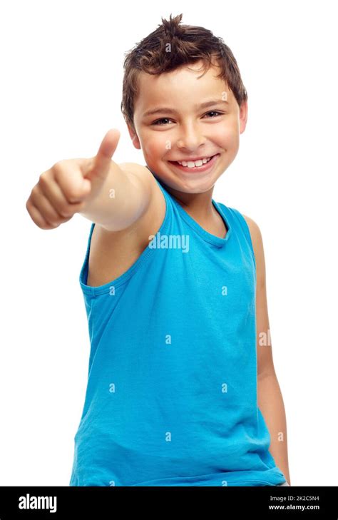 Well Done Portrait Of A Young Boy Showing You The Thumbs Up Stock