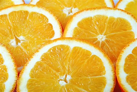 Slices Of Juicy Ripe Orange Stock Photo By ©springoz 2137424