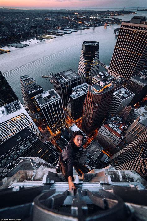Daredevil Rooftoppers Hang From New Yorks Most Iconic Skyscrapers