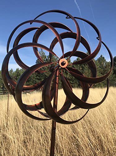 Get mesmerized and hypnotized in the endless design and motion of some for favorite garden spinners. Bronze Flower Style Kinetic Wind Garden Spinner | Farm ...