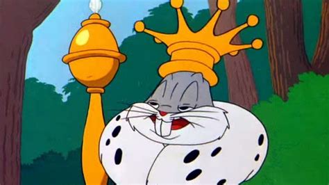 A Cartoon Character With A Crown On His Head Holding A Lamp In Front Of