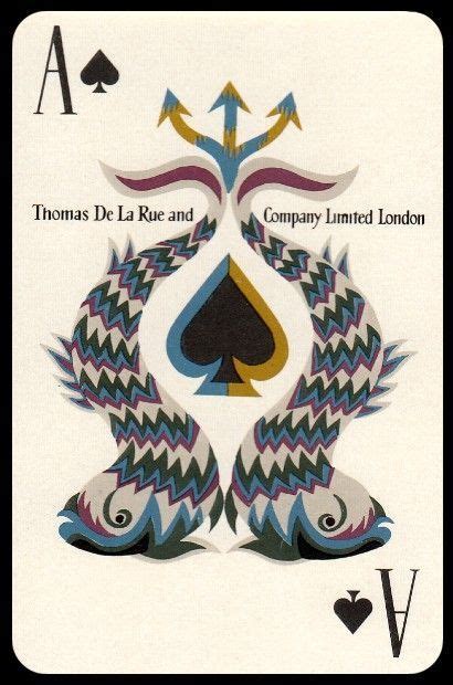The Back Side Of A Playing Card With Two Birds On It