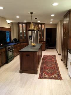 Some ceiling fans need to be installed with a down rod which brings the fan away from the flush mount ceiling fans restrict air flow. show me your island lighting for 8 foot ceilings!