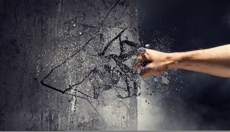 The walls are an irish rock band. Hand Breaking Through The Wall. Mixed Media Stock Image ...