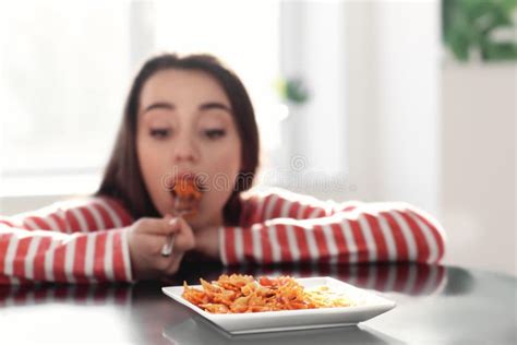 Young Woman Eating Delicious Pasta At Table Closeup Stock Image Image Of Italian Dinner