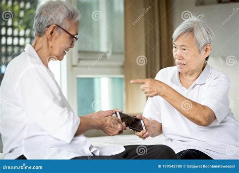 Senior Women Fighting Or Conflict For Smartphonesibling In Old Age Or