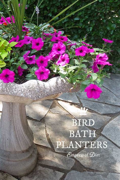 This bird bath is another made my stacked terra cotta pots and the terra cotta plate that usually sits beneath the pot to help catch water. Turn a Garden Bird Bath into a Planter - Empress of Dirt