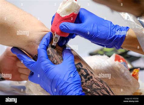 Artist Is Making The Tattoo Close Up Stock Photo Alamy