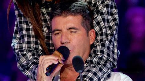 simon takes the microphone to sing for the first time in history in the x factor history simon