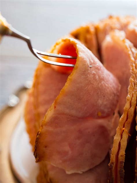Brown Sugar Bourbon Slow Cooker Spiral Ham | Recipe | Spiral ham, Spiral ham crockpot, Slow ...