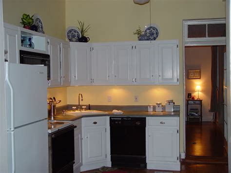 This kitchen has an illuminated star as well a large peace sign with each letter individually lit above its cabinets to create an interesting effect. Inexpensive Kitchen Makeover: $30 Under Cabinet Lighting - Old Town Home