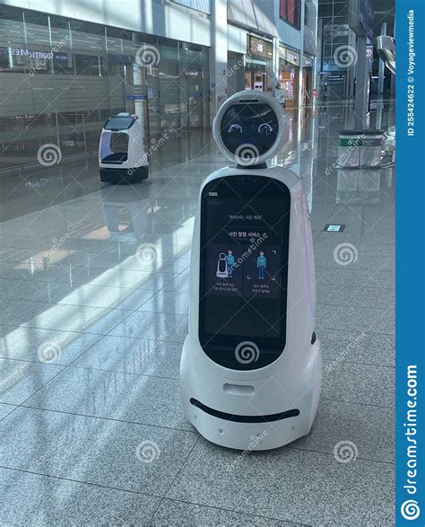 Robots Serve Travelers For Covid And Baggage Editorial Photography