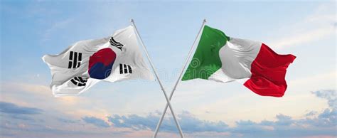 Two Crossed Flags South Korea And Italy Waving In Wind At Cloudy Sky Concept Of Relationship
