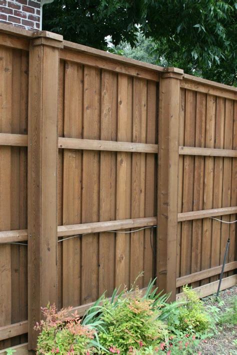 Wooden fence on a residental terrace. Wood Fence Designs To Suit Your House - Interior ...