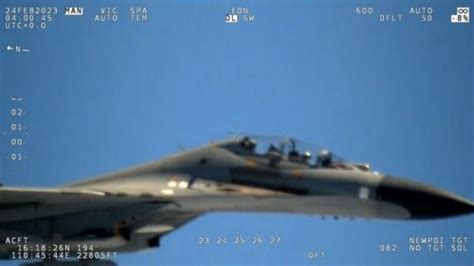 Watch Chinese Fighter Jets Warning To Us Navy Plane In South China