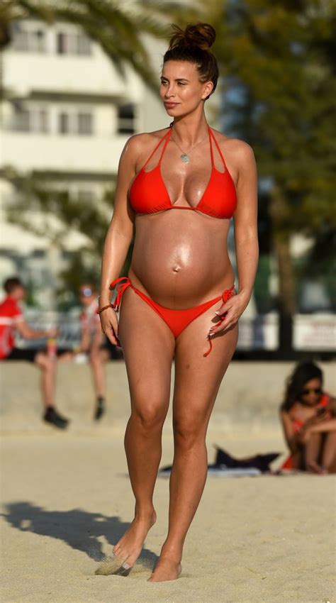 Pregnant Ferne McCann Sizzles On The Beach In Red Hot Bikini As She