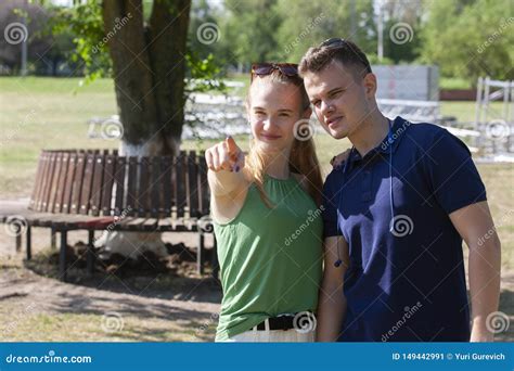 Beautiful Loving Couple Flirting In The Park On Beautiful Sunny Day