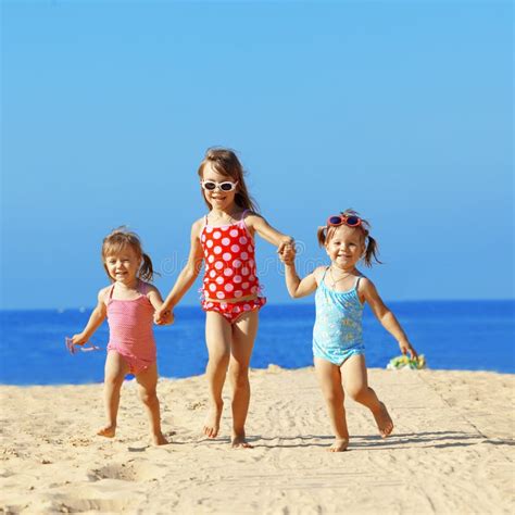Kids Playing At The Beach Stock Photo Image Of Barefoot 20267778