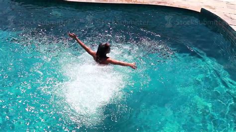 Young Brunette Woman Jumping In Swimming Pool Top Of View 1920x1080