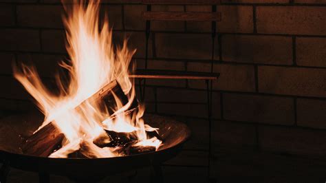 Download Wallpaper 3840x2160 Bonfire Fire Flame Wood Chair 4k Uhd