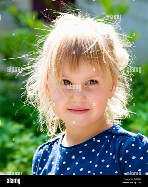 Portrait Of A Beautiful Little Girl With Blond Hair Stock Photo Alamy