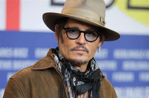 Johnny depp outside court during his libel trial against the sun . Johnny Depp Must Face Ex's Libel Suit After His Attorney ...